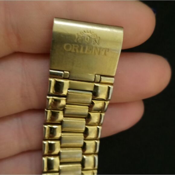 Golden Orient watch with a dark blue face - Picture 9 of 11